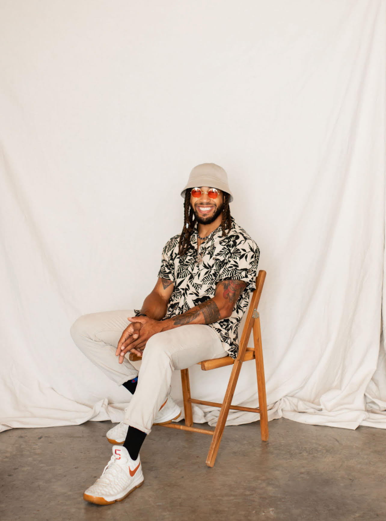 Headshot of Marsalis Carlos, Creative Director